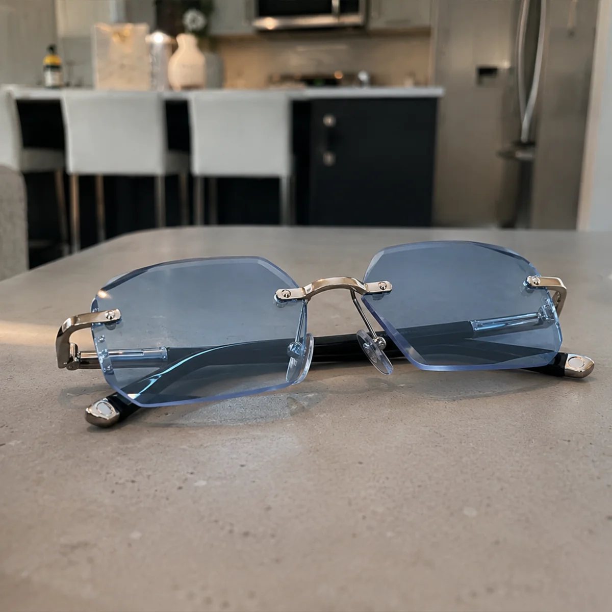 BlueLume glasses resting on a kitchen counter